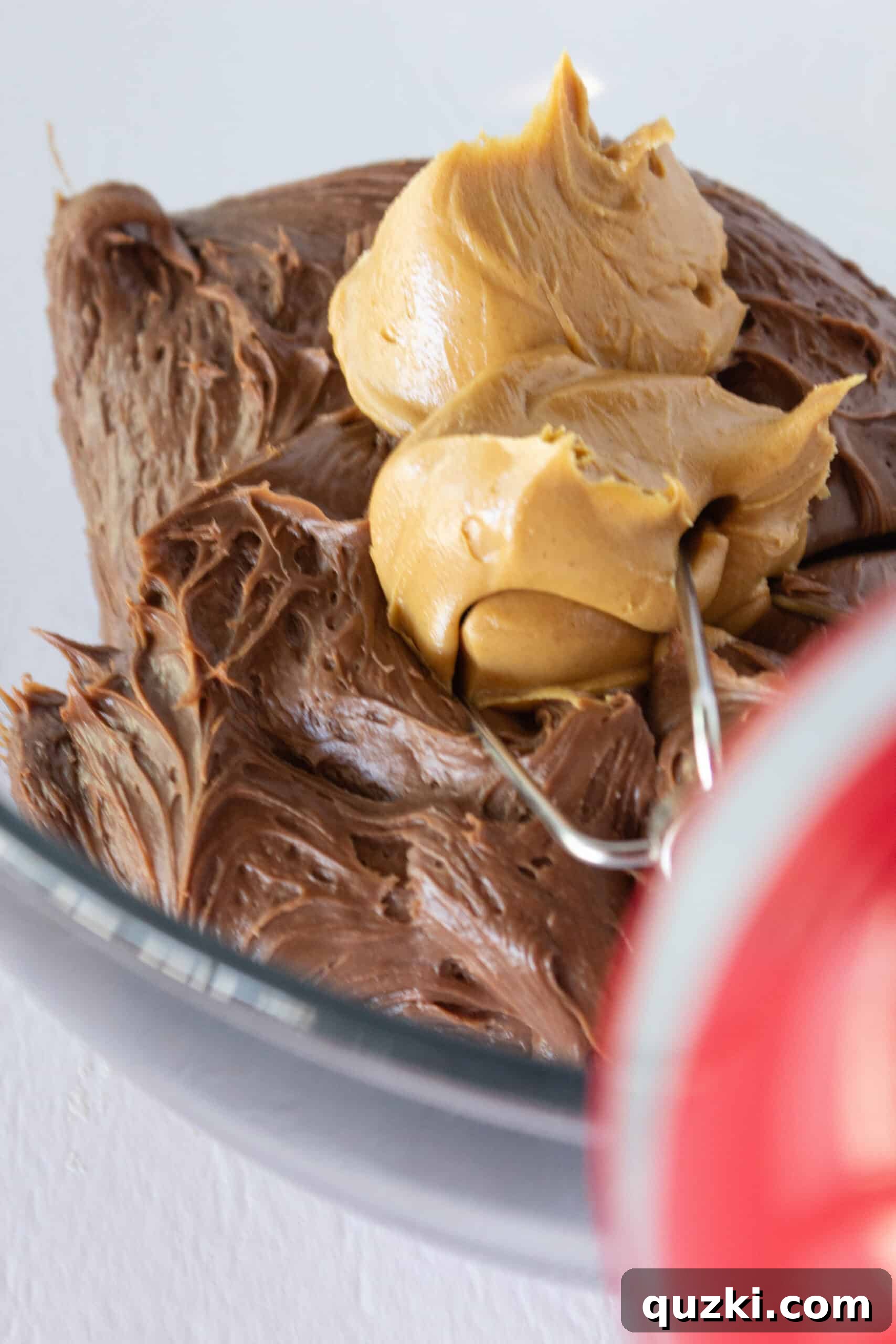 Ultimate Snickers Cookie Cups 8 Adding peanut butter to store-bought chocolate frosting to create the delicious topping.