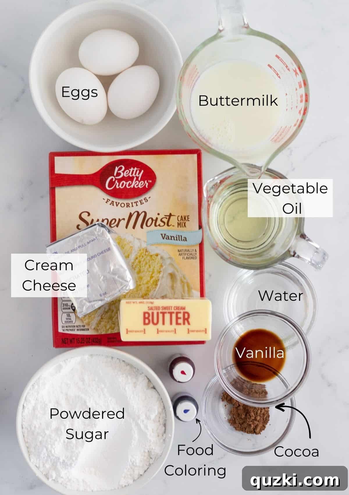 Easy Patriotic Burst Bundt 3 A collection of fresh ingredients laid out on a table, including cake mix, eggs, oil, buttermilk, food coloring, and cream cheese, essential for making a red, white, and blue firecracker cake.