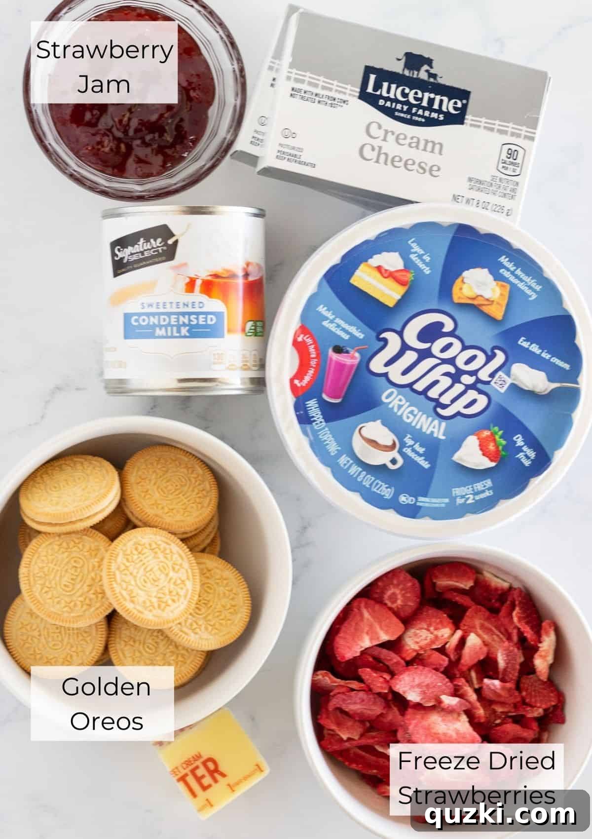 All the essential ingredients neatly laid out for making the Strawberry Crunch No-Bake Cheesecake.
