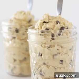 Edible Cookie Dough served in jars with spoons.