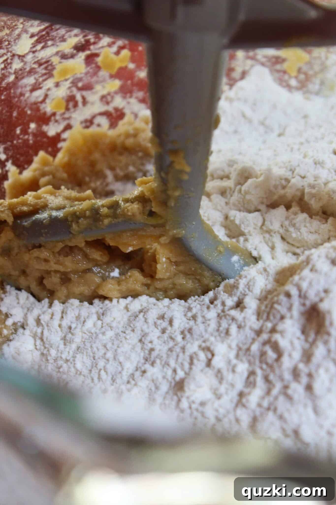 Ultimate Reese's Peanut Butter Cup Cookies 7 Dry ingredients (flour, cornstarch, baking soda, salt) being gently mixed into the cookie dough