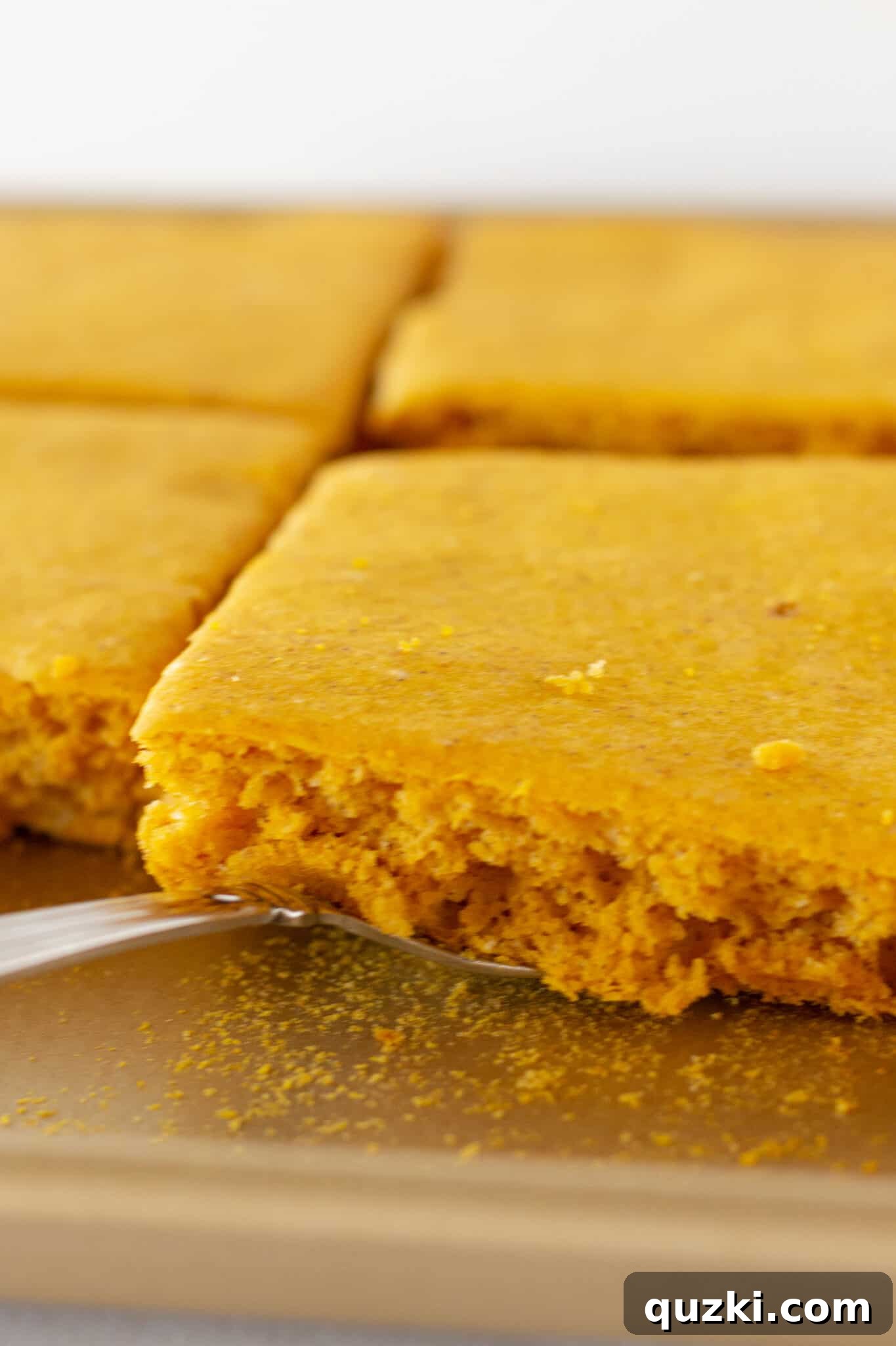 Effortless Sheet Pan Pumpkin Pancakes from Mix 3 Close-up of golden brown Pumpkin Sheet Pan Pancakes, ready to be cut and served for a delicious fall breakfast.