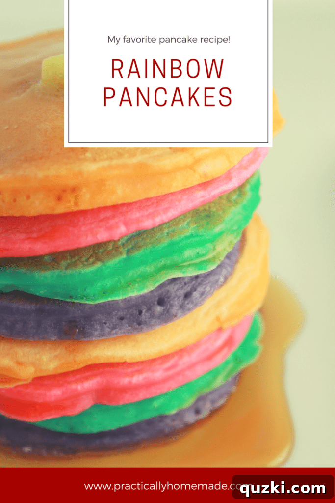 Stacked fluffy rainbow pancakes topped with butter and maple syrup on a white plate