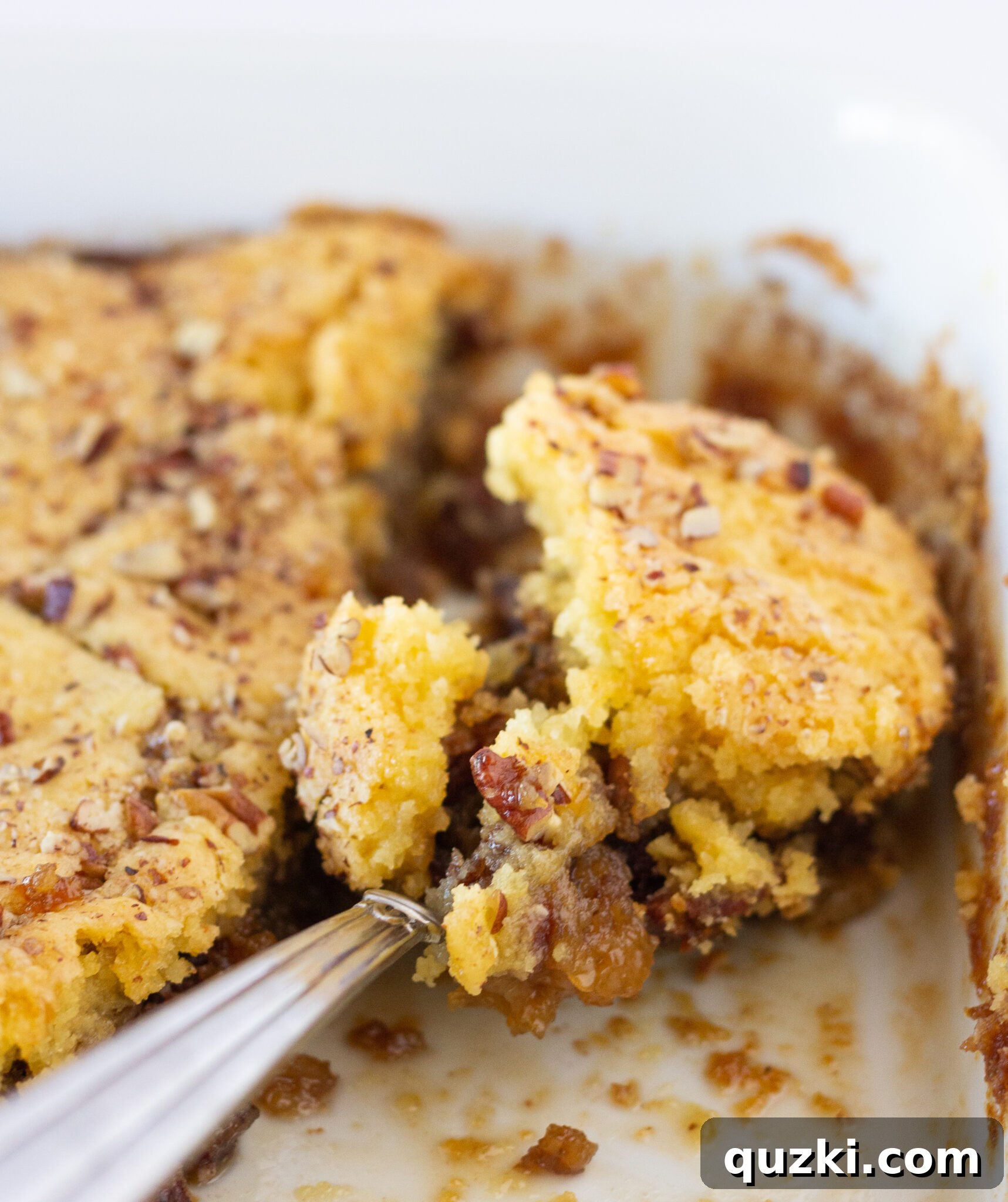 Freshly baked Pecan Pie Cobbler with a Cake Mix, cooling on a rack, ready for serving or storage.