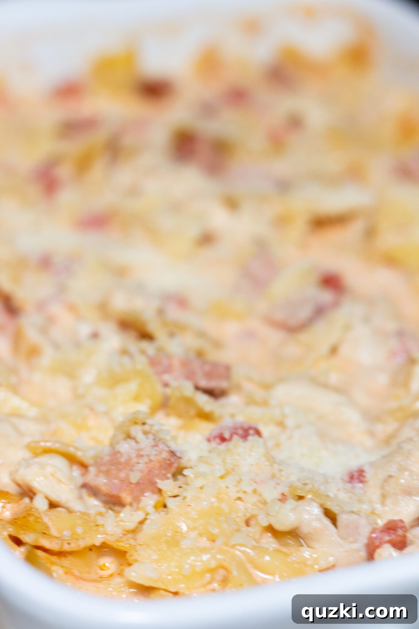 The Easy Cajun Chicken Pasta Casserole immediately after its first bake, steaming and ready for the final touches.