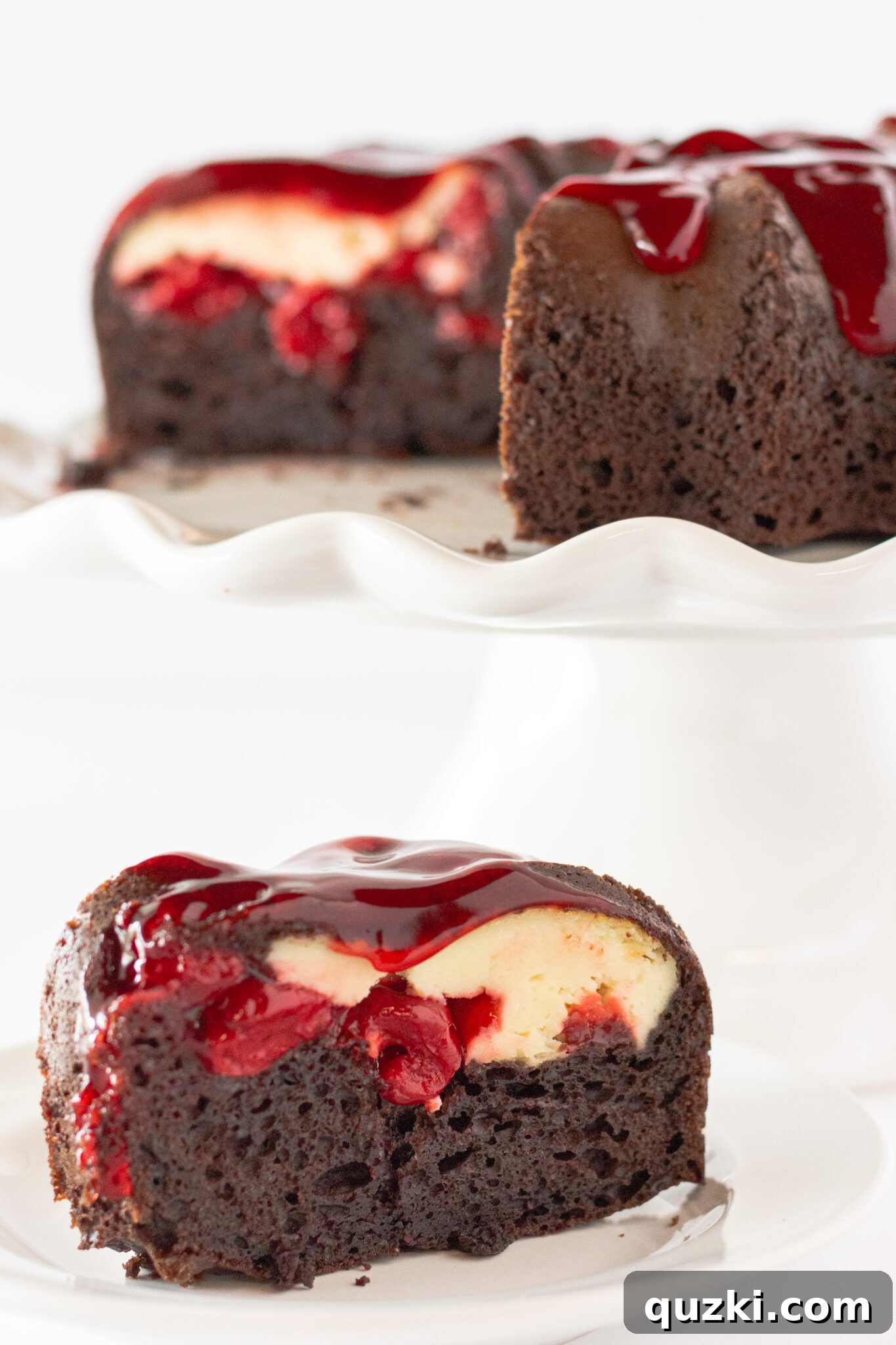 Delicious slice of Cherry Cheesecake Chocolate Bundt Cake, showing the inner layers of cake and cheesecake.