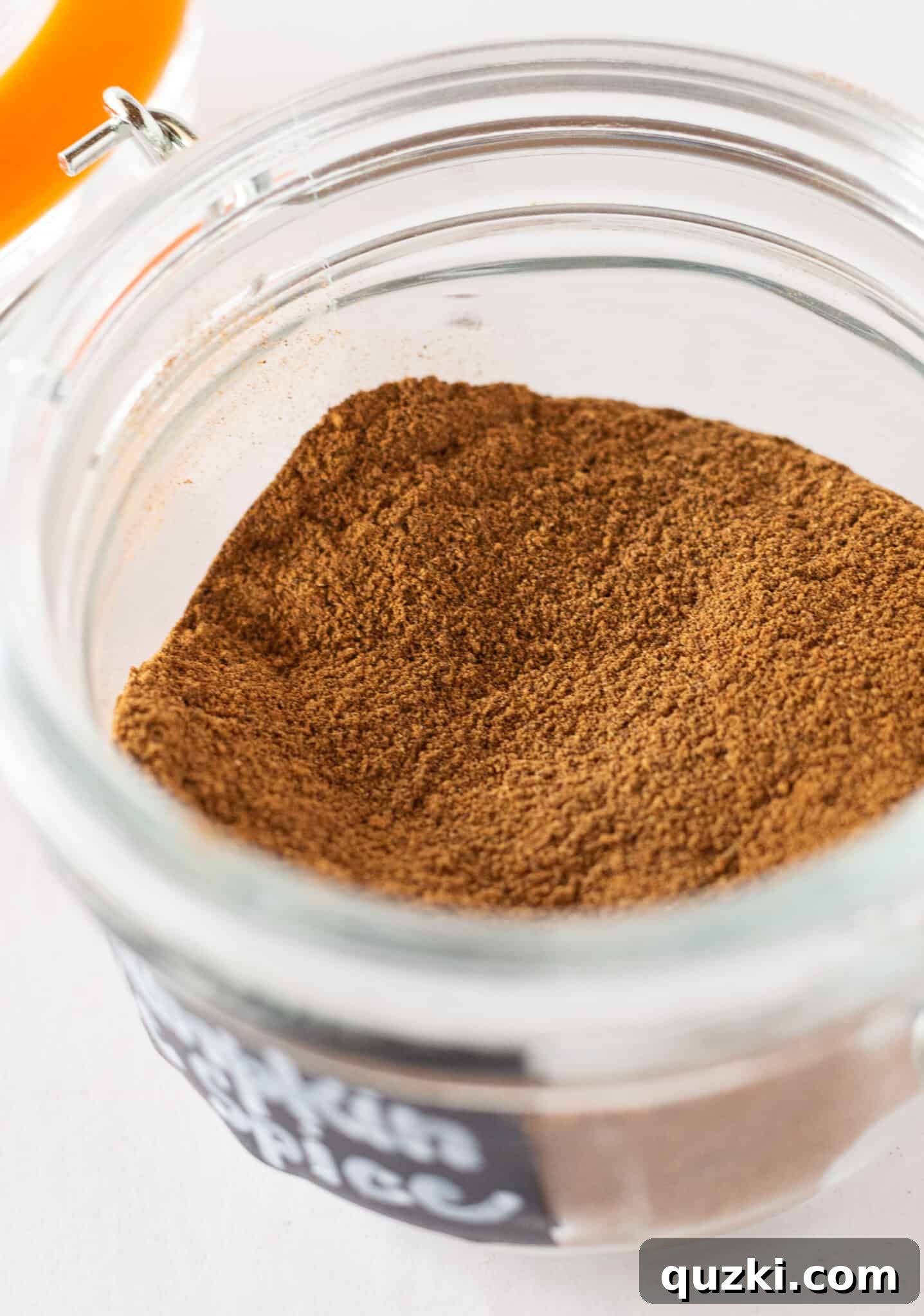 Perfect Homemade Pumpkin Spice 5 Homemade Pumpkin Pie Spice in a small, labeled glass jar, ready for baking.