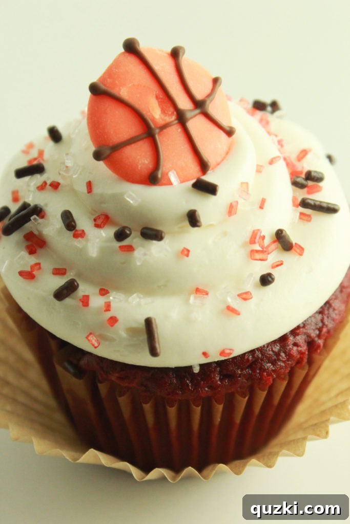 Slam Dunk Cupcake Toppers 7 Basket of homemade basketball cupcakes, perfect for sharing and celebrating sports events.