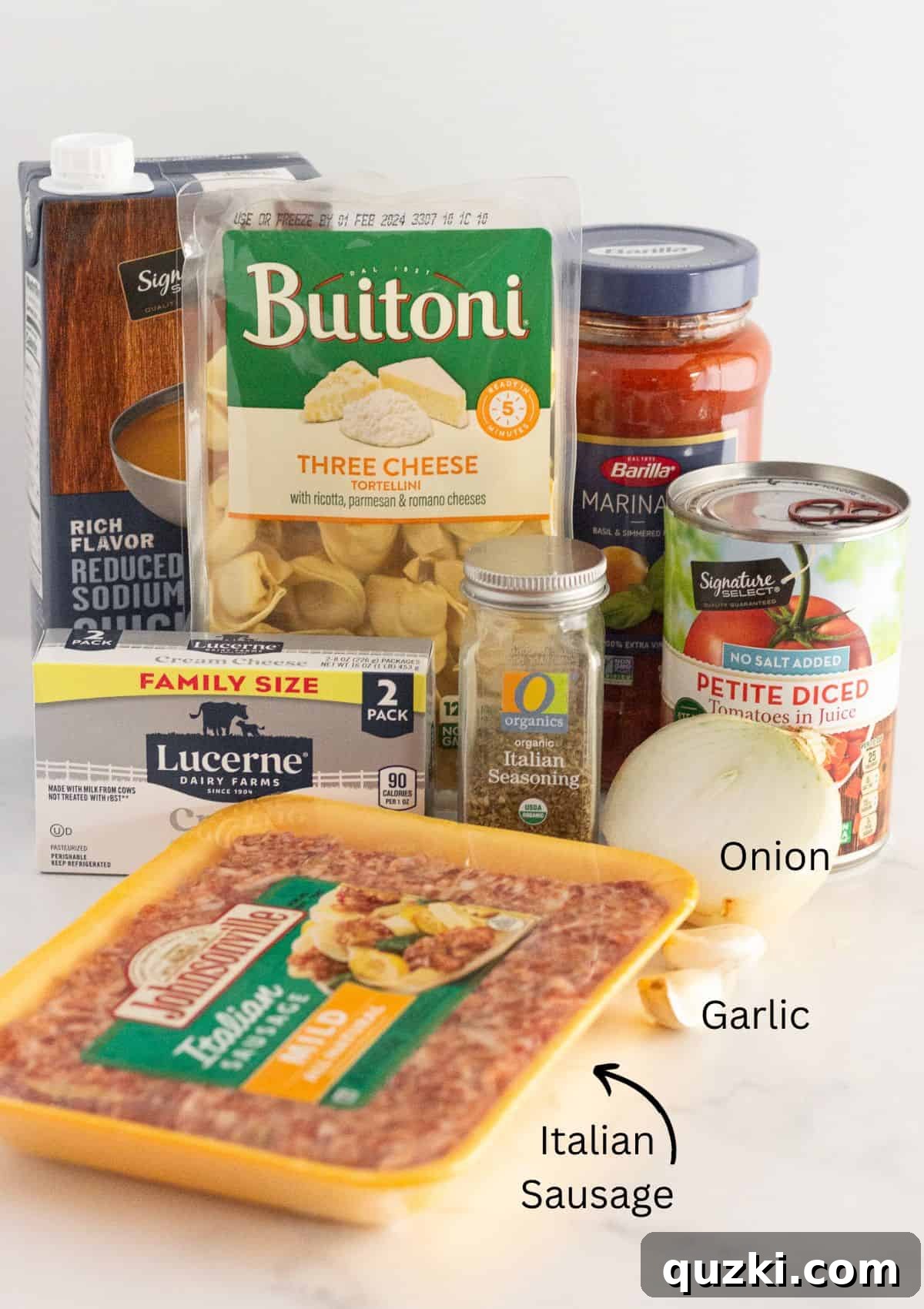 Cozy Slow Cooker Creamy Sausage Tortellini Soup 3 The ingredients needed to make creamy tortellini soup.