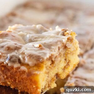 Easy Cinnamon Roll Cake Recipe Made with a Cake Mix by top US food blogger, Practically Homemade