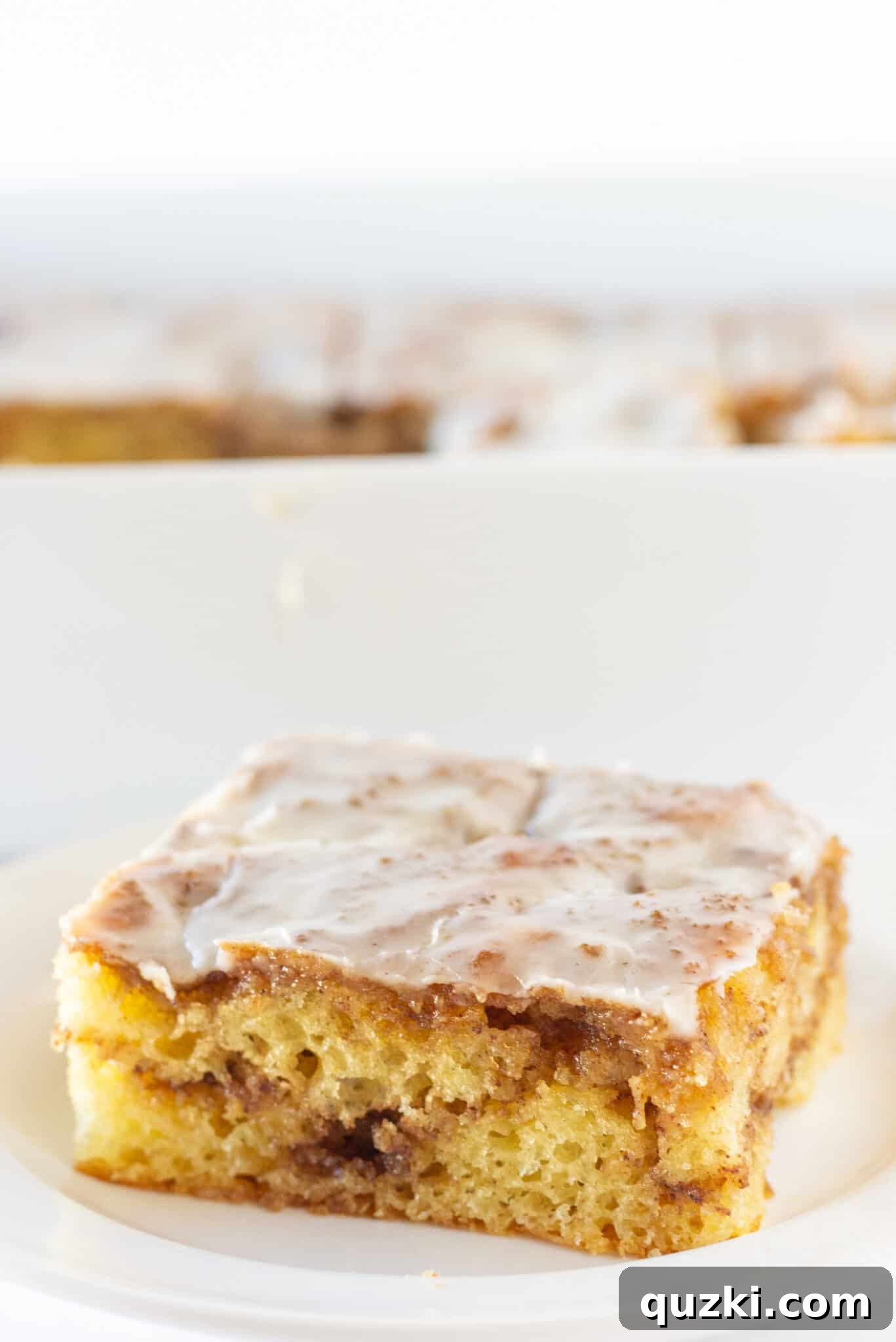 Effortless Cinnamon Roll Cake 3 Easy Cinnamon Roll Cake Recipe made with a cake mix, showcasing its simple yet delicious appeal.