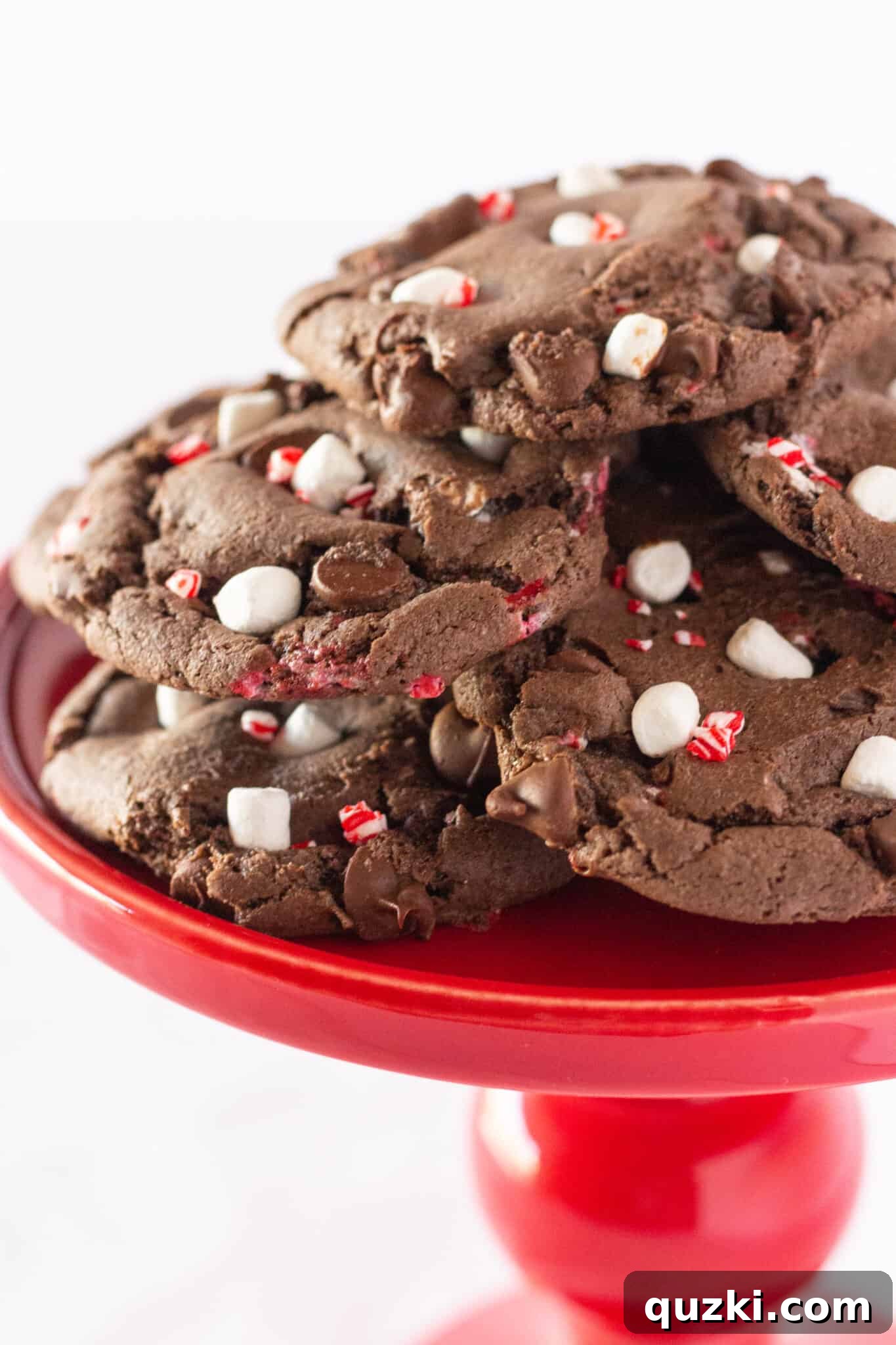 Cake Mix Peppermint Hot Cocoa Cookies 3 Easy Hot Cocoa Peppermint Cookies arranged beautifully on a vibrant red cake plate.
