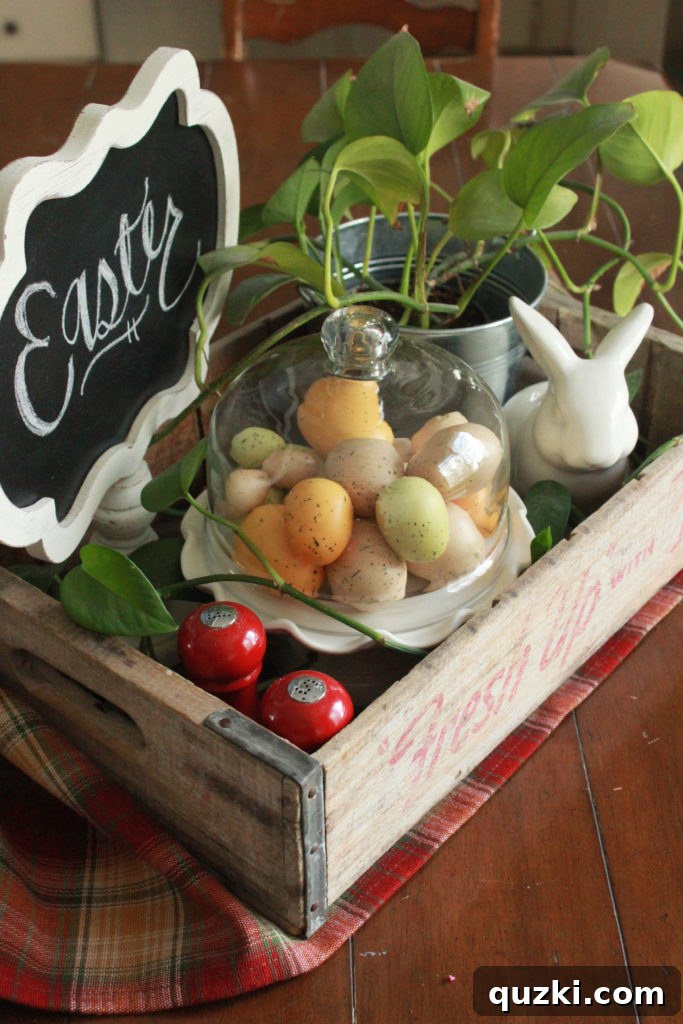 Hop into Easter Decor Ideas 12 Kitchen table decorated for Easter with a rustic wooden crate containing a sweet white bunny figurine, an abundance of speckled eggs, and a small white chalkboard with a spring message, adding charming holiday touches.