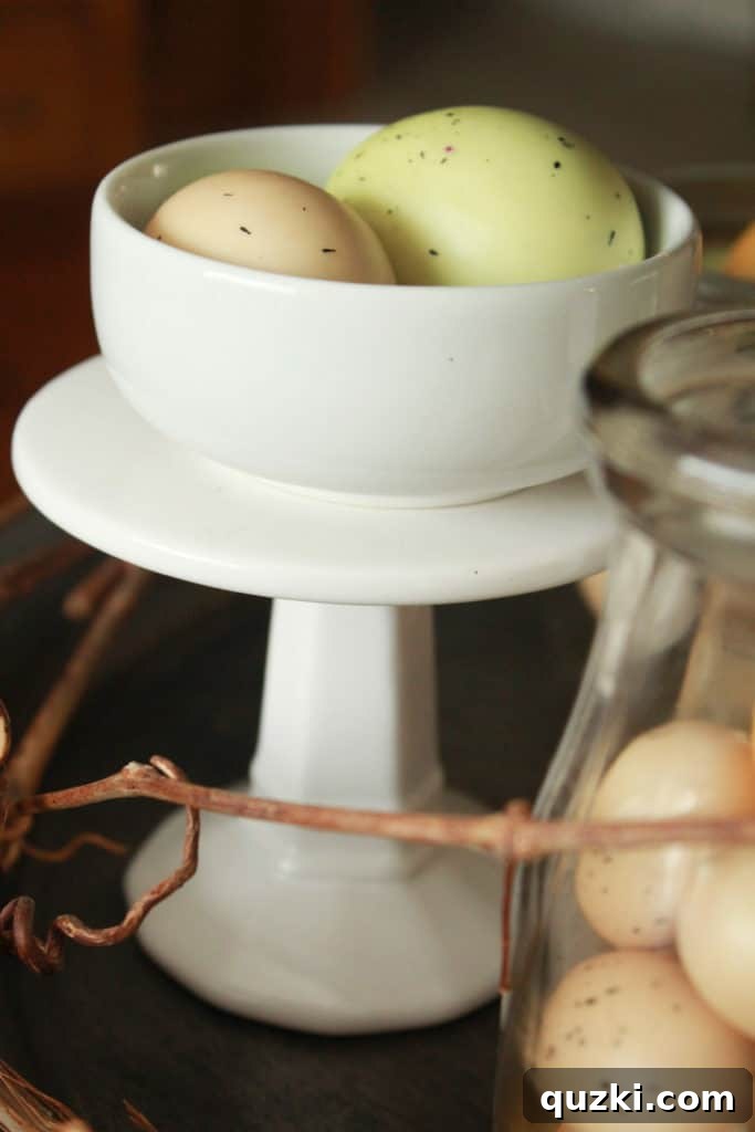 Hop into Easter Decor Ideas 7 Full view of the finished Easter tiered tray display, showcasing all three meticulously styled tiers with cohesive spring and farmhouse-inspired decor elements, ready to adorn any home.