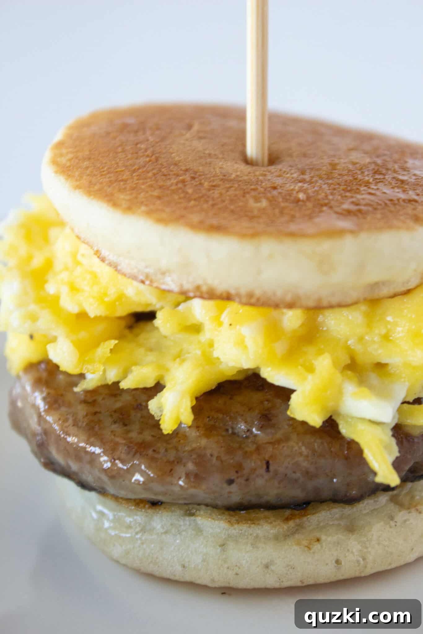 Sweet and Savory Pancake Sausage Egg Sliders 2 Delicious Pancake Sausage and Egg Sliders with maple butter glaze, perfect for an easy breakfast or breakfast for dinner
