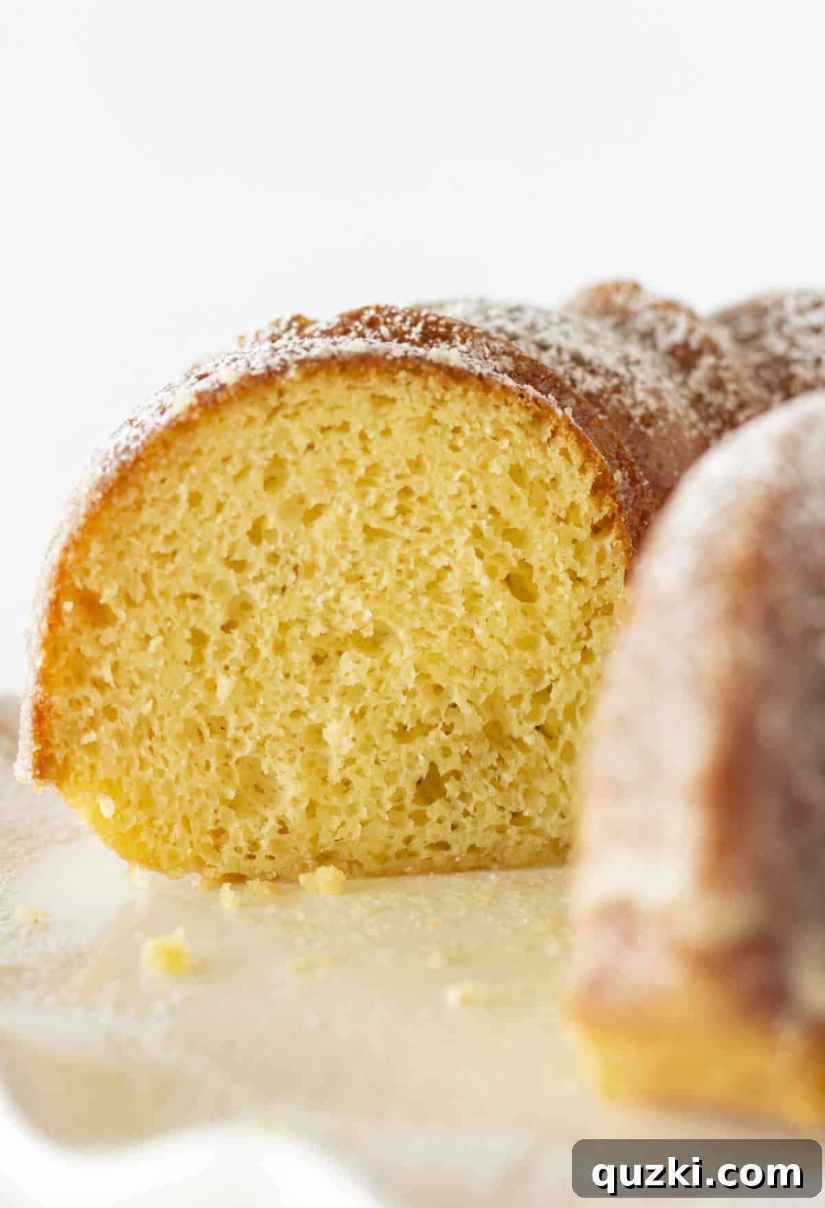 Stunning Christmas Bundt Cakes to Dazzle Your Guests 9 A close-up view of the interior of a Kentucky Butter Bundt Cake, showcasing its perfectly moist and tender crumb.