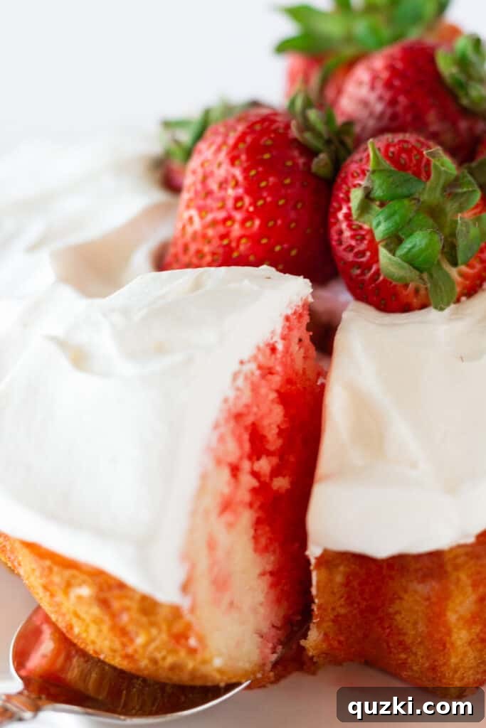 Strawberry Burst Bundt Cake 2 Strawberry Bundt Poke Cake with Jello, a recipe featured by top US dessert blogger, Practically Homemade