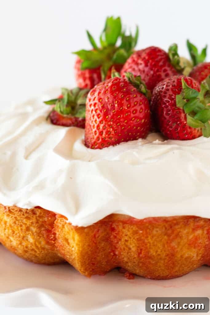 Strawberry Burst Bundt Cake 3 Strawberry Bundt Poke Cake with Jello, a recipe featured by top US dessert blogger, Practically Homemade