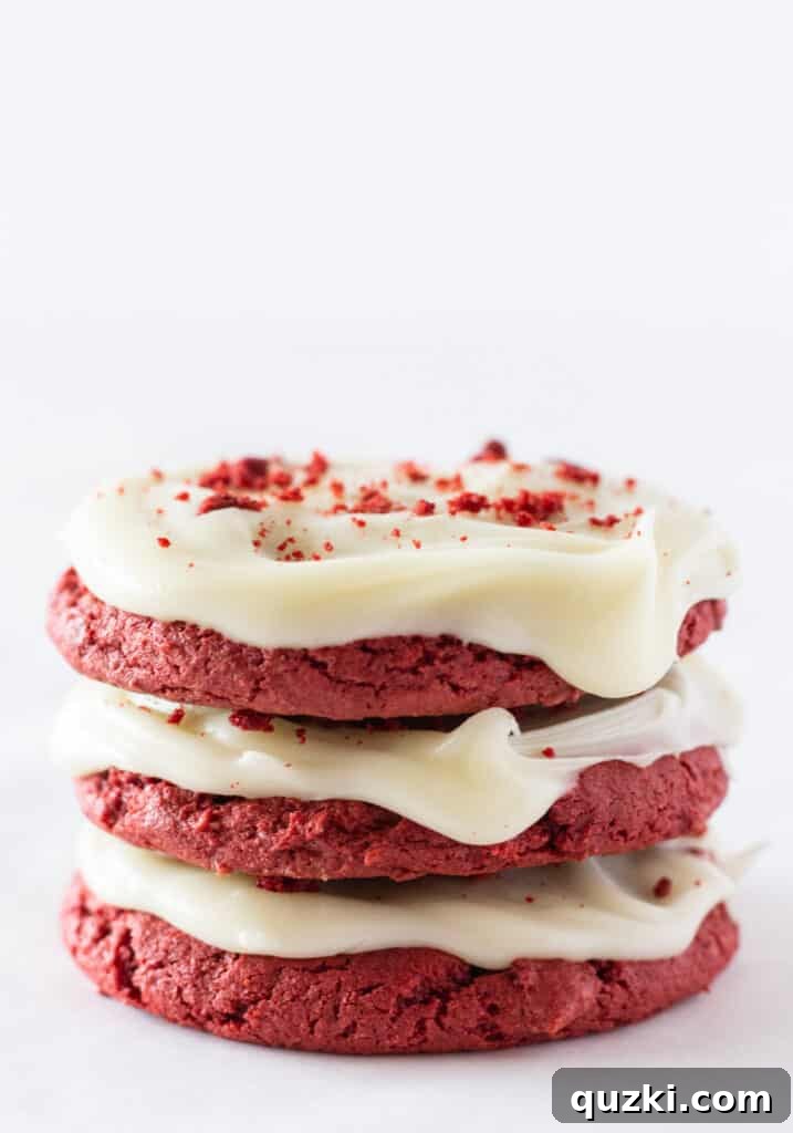 Festive Red Velvet Sheet Cake Cookies recipe with a cake mix and cream cheese glaze, by top US cookies blogger, Practically Homemade