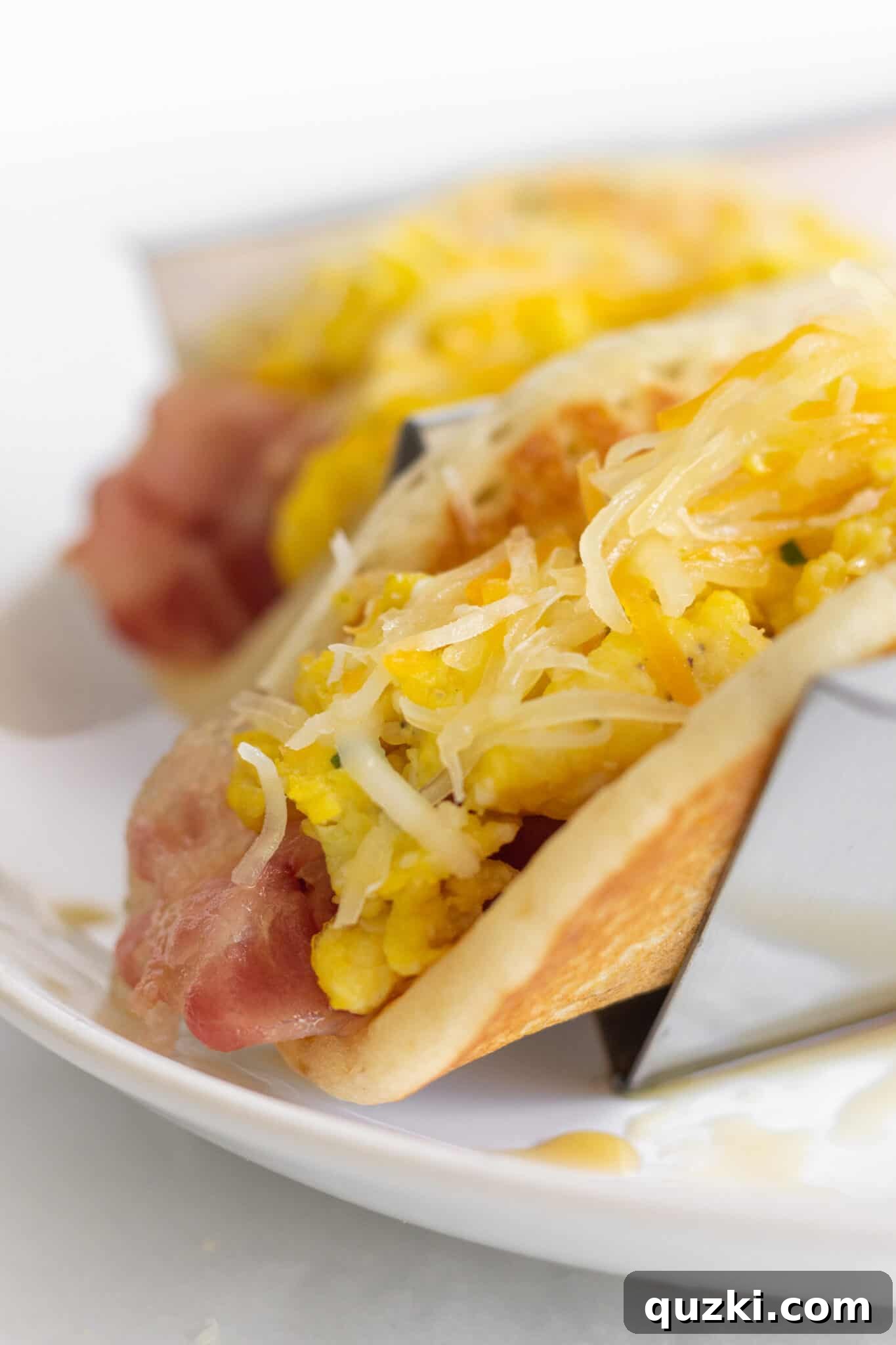 Flapjack Taco Twists 5 A beautifully plated serving of pancake tacos, ready to be enjoyed as a satisfying breakfast.