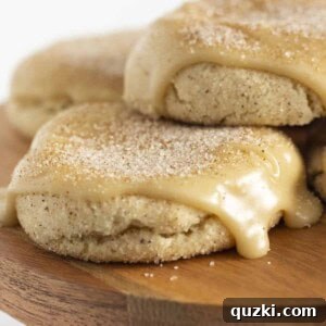 Churro cookies on a wooden cake plate, beautifully arranged.