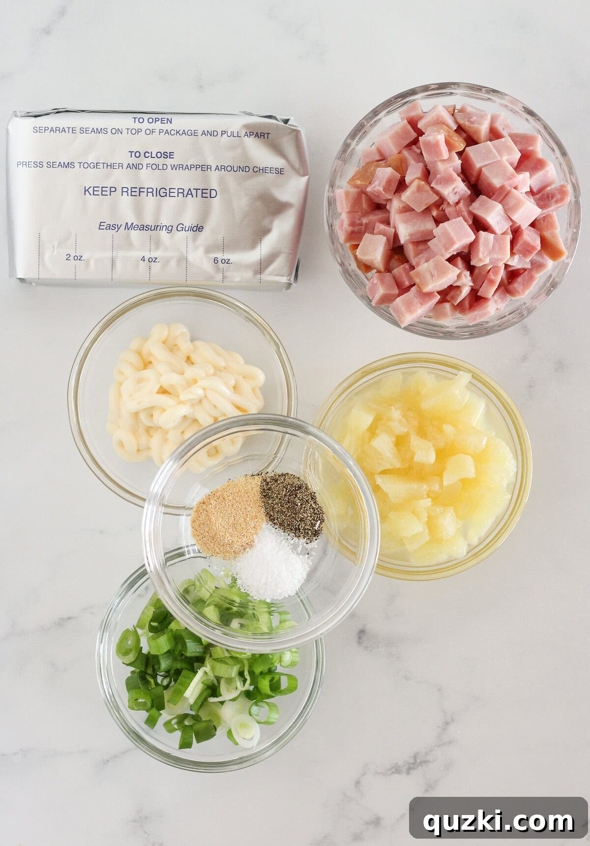 Effortless Hawaiian Ham Dip 3 The ingredients needed to make Hawaiian Dip laid out on a table.