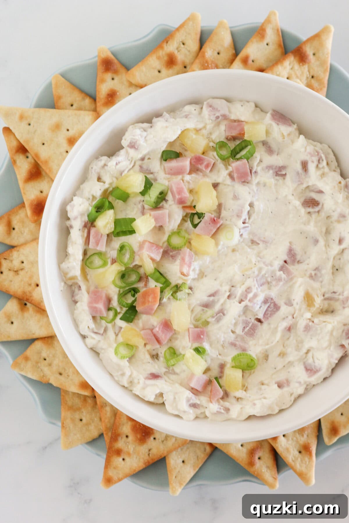 Effortless Hawaiian Ham Dip 7 The Hawaiian dip in a bowl and ready to serve with crackers.