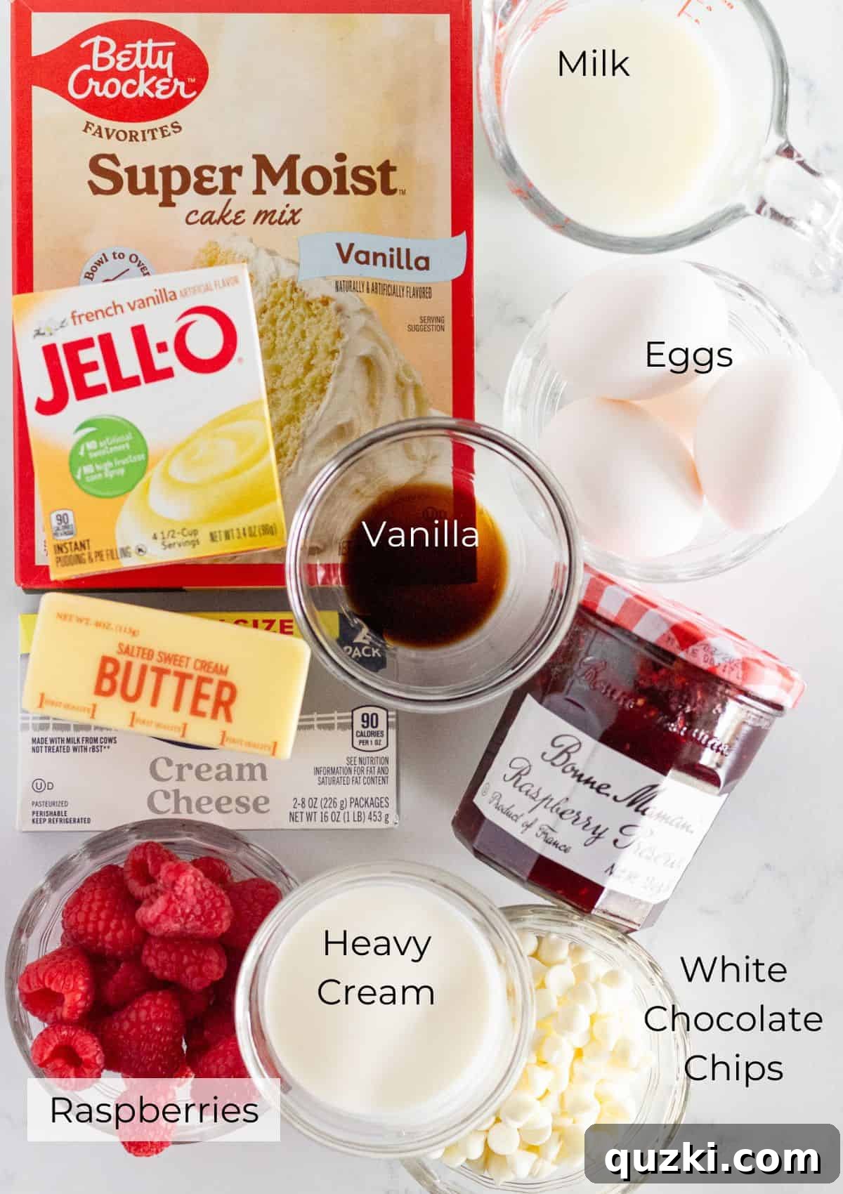 Ingredients needed to make a white chocolate raspberry cake.