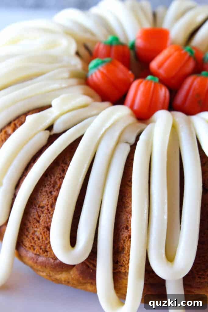 45 Simple & Stunning Cake Mix Bundt Cake Recipes 23 Pumpkin Spice Bundt Cake with Cream Cheese Frosting recipe featured by top US food blog, Practically Homemade