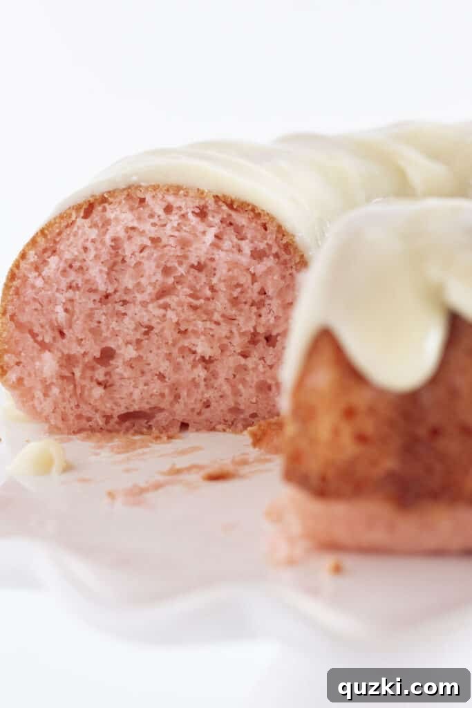 45 Simple & Stunning Cake Mix Bundt Cake Recipes 35 Looking at the inside of pink velvet cake.