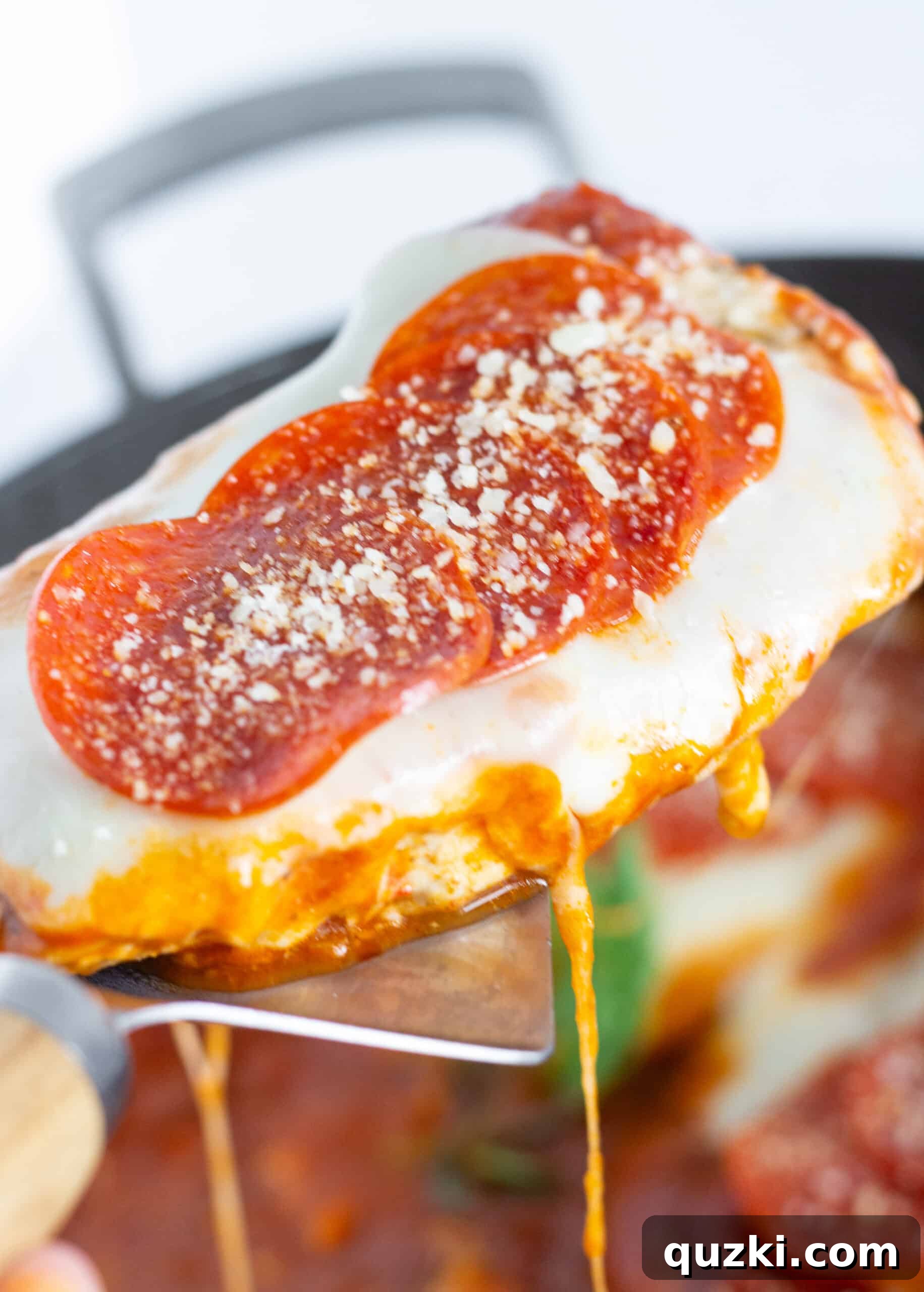 Serving Chicken Pepperoni Pizza Skillet.