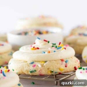 A top-down view of a beautifully frosted Crumbl Copycat Birthday Cake Cookie.