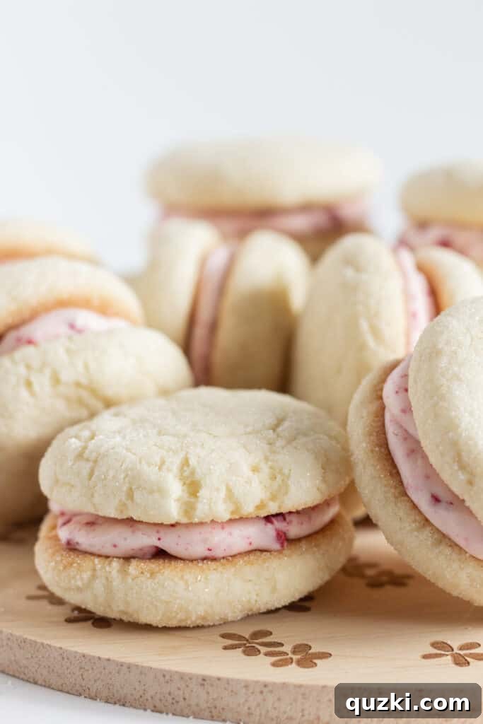 Pillowy Raspberry Cream Cheese Sandwich Cookies 5 Sugar Cookie Sandwiches with Raspberry Cream Cheese Frosting, by Top US cookie blog Practically Homemade