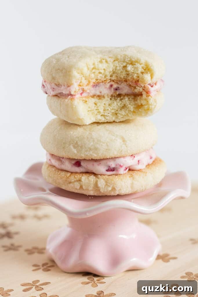 Pillowy Raspberry Cream Cheese Sandwich Cookies 6 Sugar Cookie Sandwiches with Raspberry Cream Cheese Frosting, by Top US cookie blog Practically Homemade