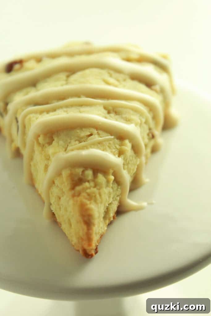Maple Pecan Bliss Scones 12 Drizzling maple glaze over freshly baked maple pecan scones.