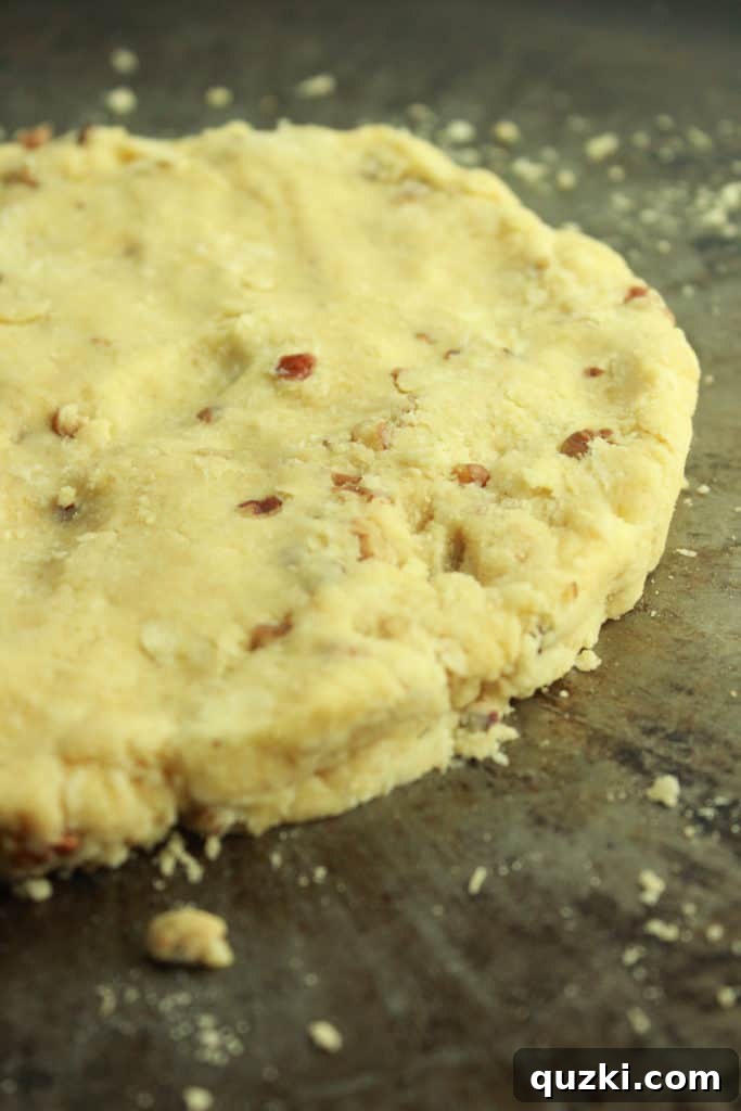 Maple Pecan Bliss Scones 9 Dividing scone dough in half and shaping each into a round.