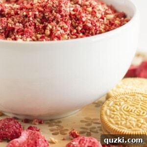 Strawberry crunch topping in a white bowl, ready to be served.