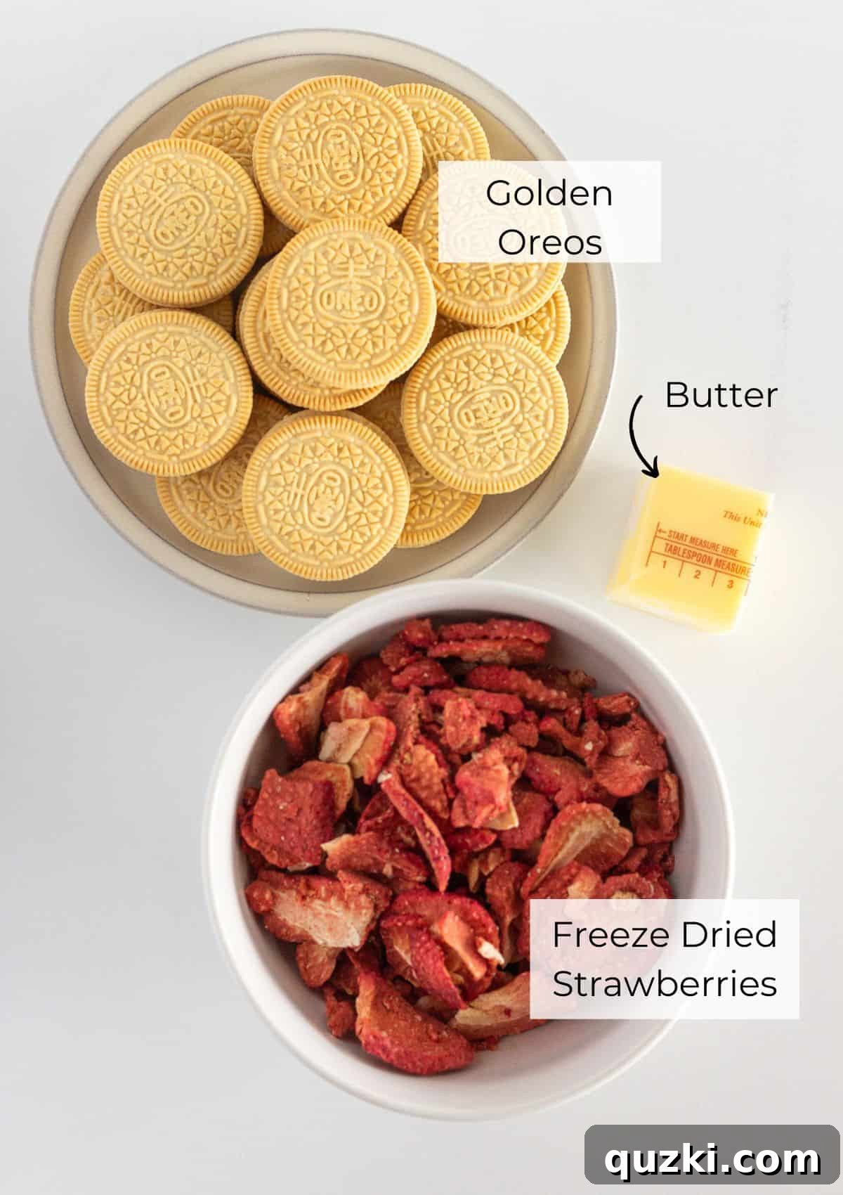 Irresistible Strawberry Crunch Topping 3 Three ingredients laid out on a white surface: freeze-dried strawberries, Golden Oreo cookies, and a stick of butter.