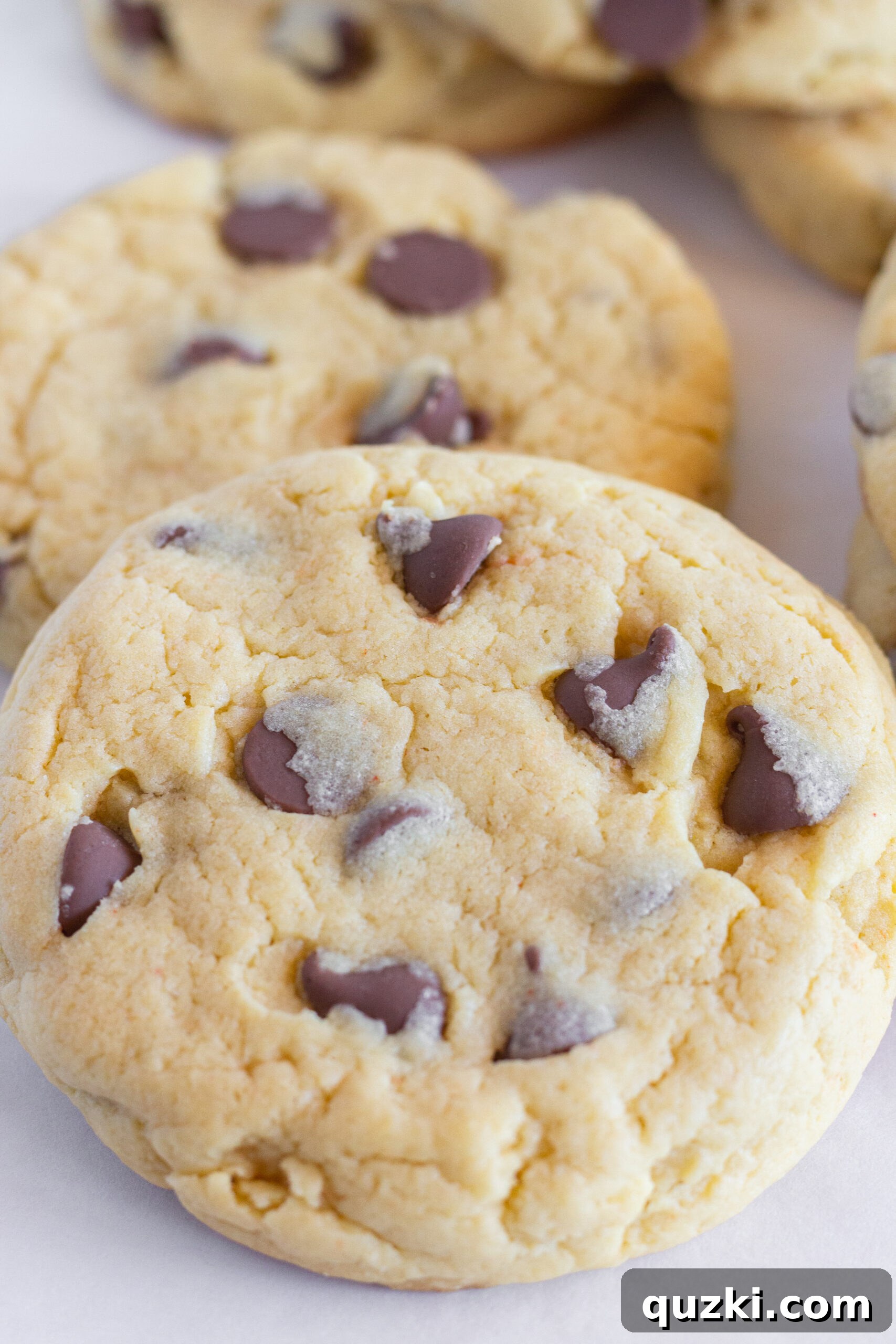 Delicious and easy chocolate chip cookies made with a cake mix, featuring a soft and chewy texture, from Practically Homemade