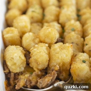 A deliciously baked sloppy joe tater tot casserole, ready to be served.