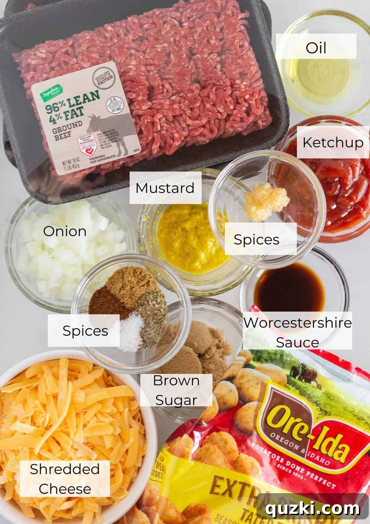 A visual display of all the fresh ingredients required to prepare a delicious sloppy joe tater tot casserole, neatly arranged.