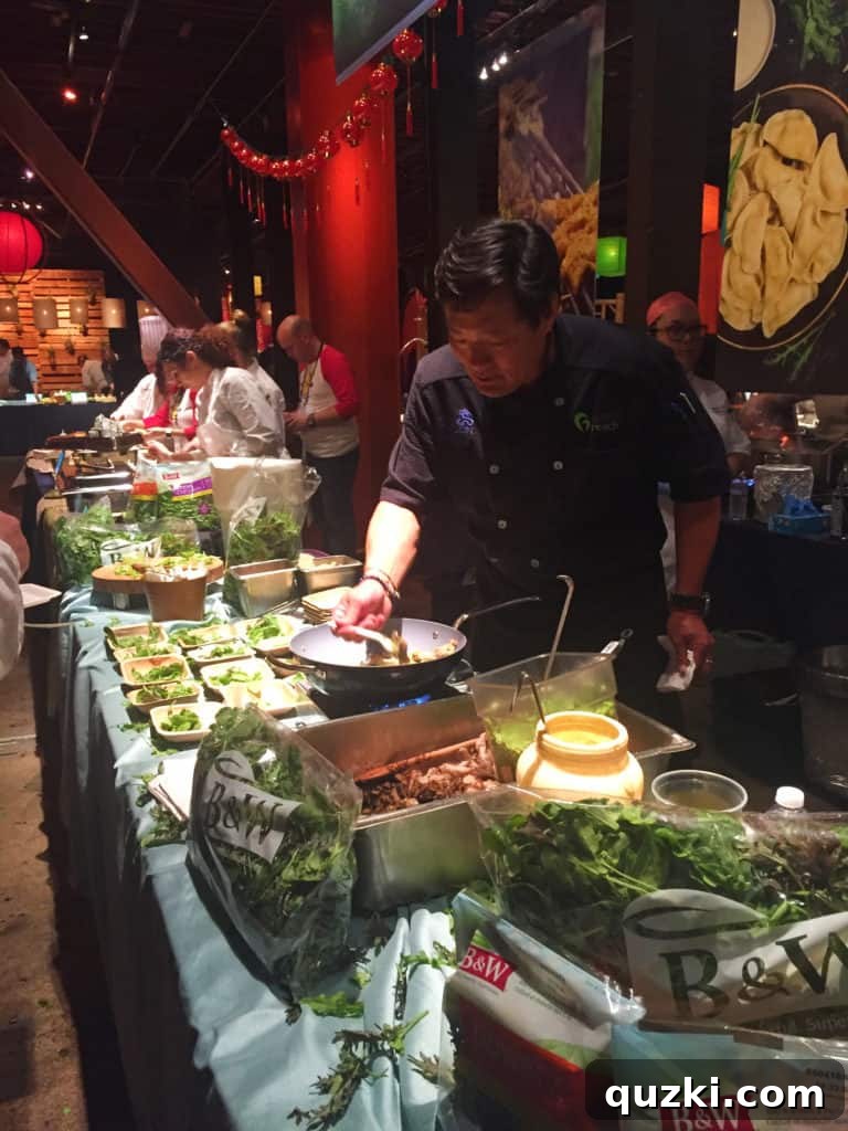 A famous international chef preparing a specialty dish at their station