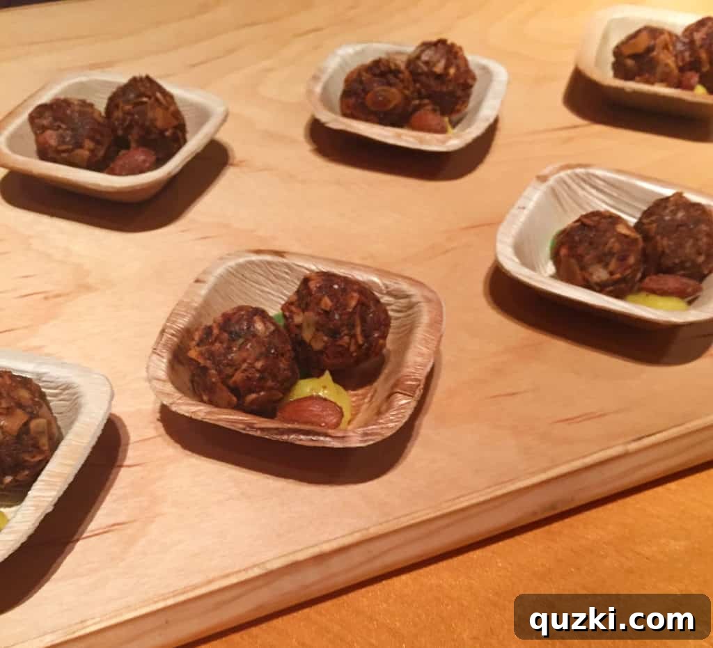A diverse selection of gourmet appetizers and small plates from the food stations