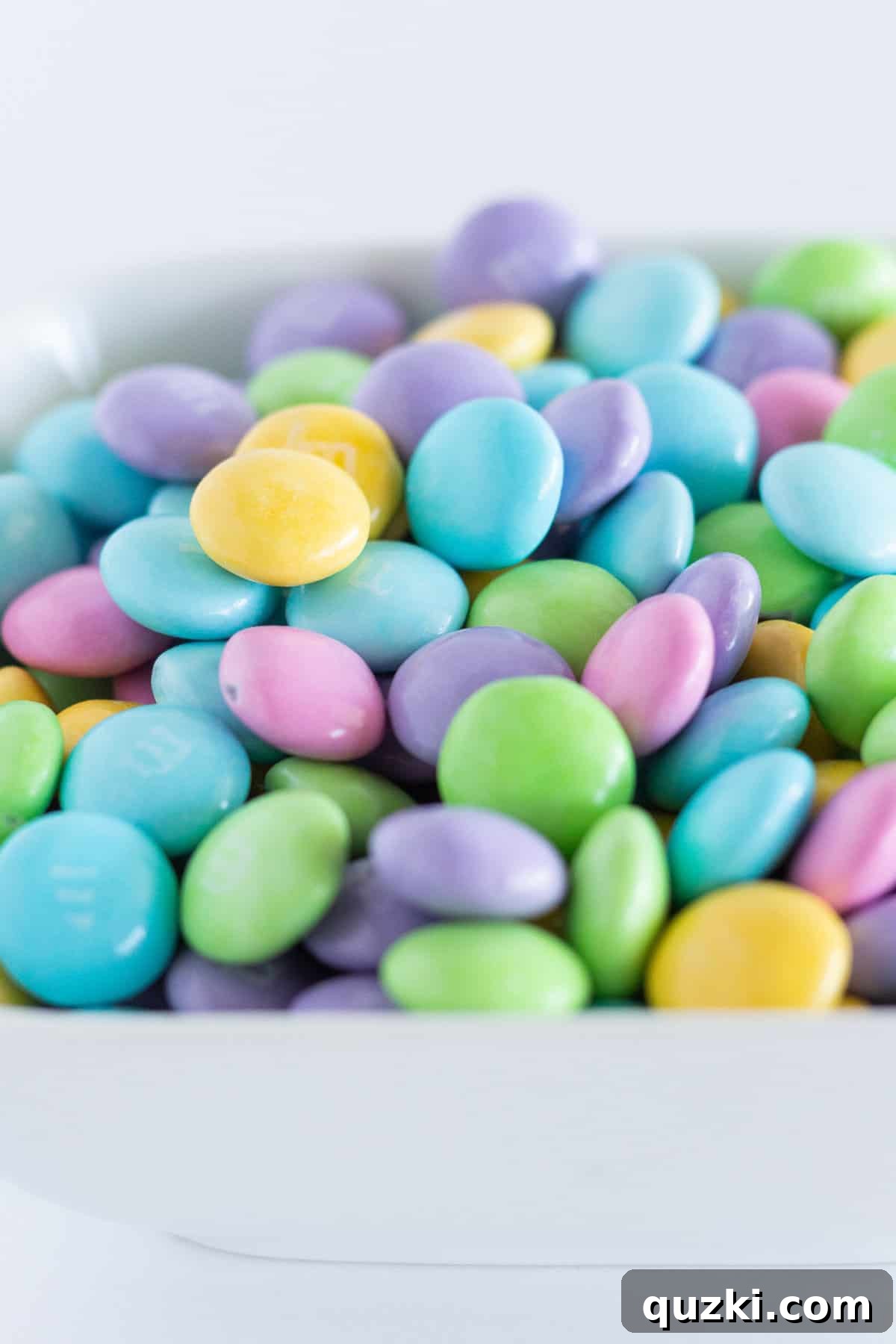 Hoppy Easter Chocolate Chip Delights 4 A small bowl full of Easter M&M's.