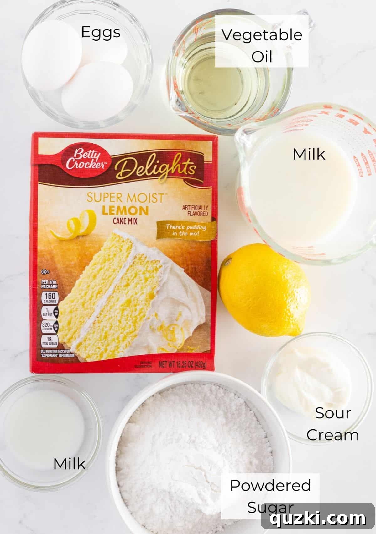All the essential ingredients for baking a batch of irresistible mini lemon bundt cakes, neatly arranged for preparation.