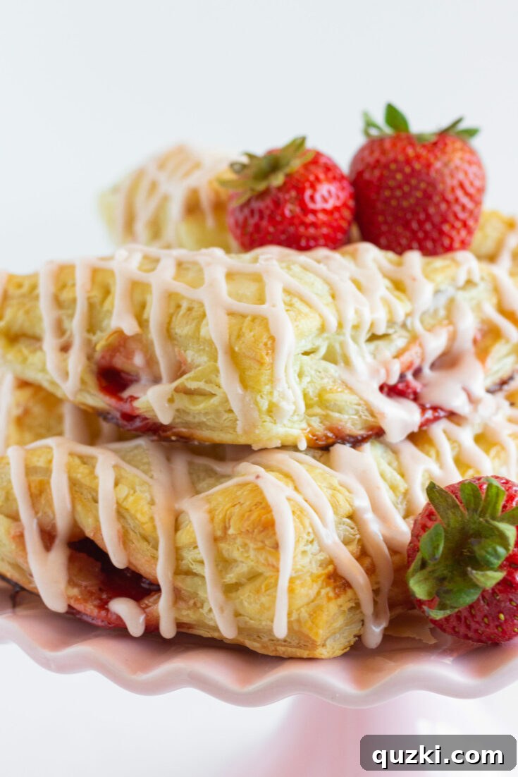 Flaky puff pastry strawberry turnovers, a sweet and simple treat perfect for Mother's Day.