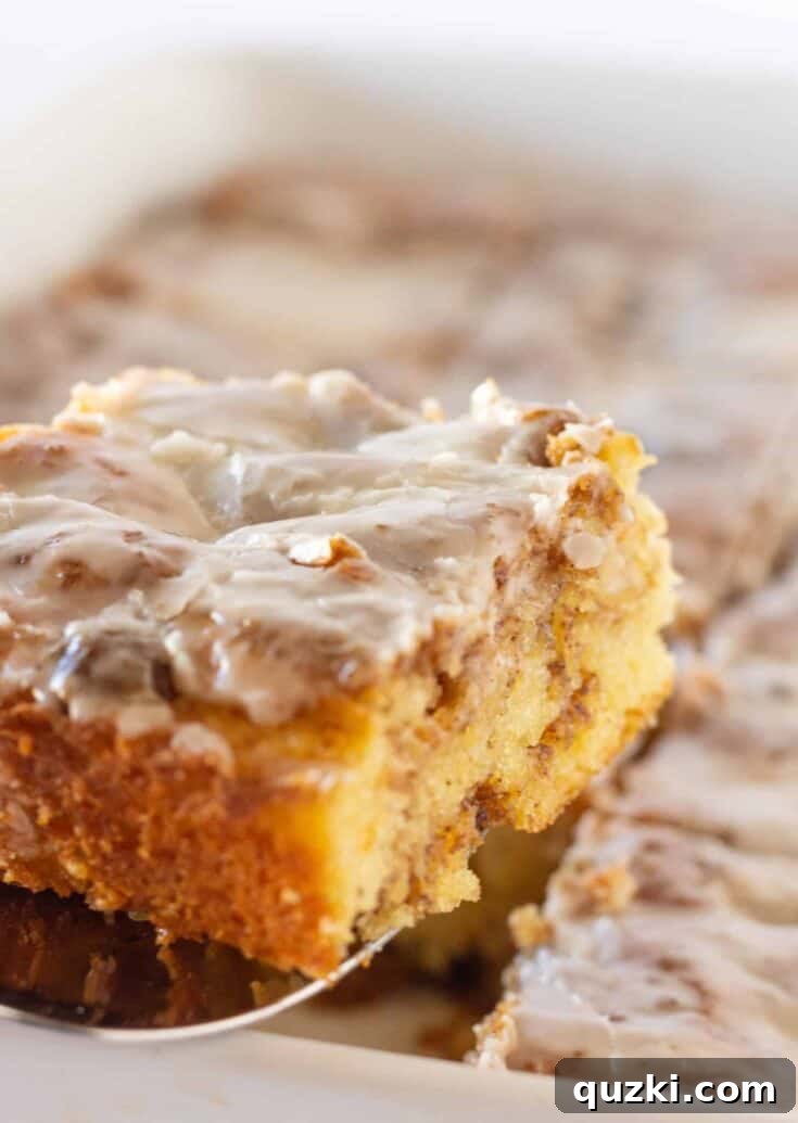 Delicious cinnamon roll cake made with a cake mix, drizzled with sweet icing, perfect for Mother's Day breakfast or dessert.