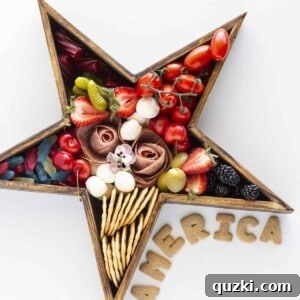 A star shaped wooden board with a simple 4th of July Charcuterie Board.