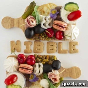 Two enticing Mini Charcuterie Boards, showcasing their delightful contents.