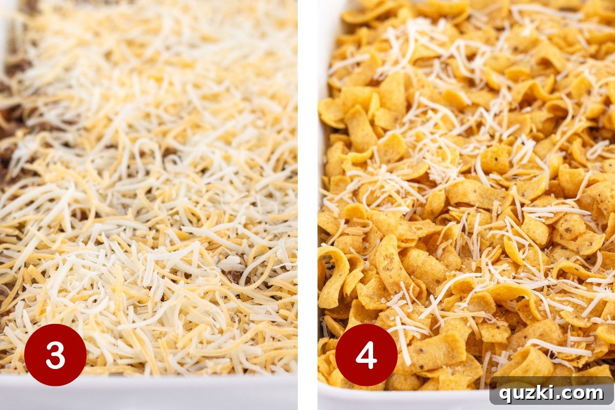 Image demonstrating the addition of shredded cheese over the beef mixture, followed by a layer of Fritos corn chips on top.